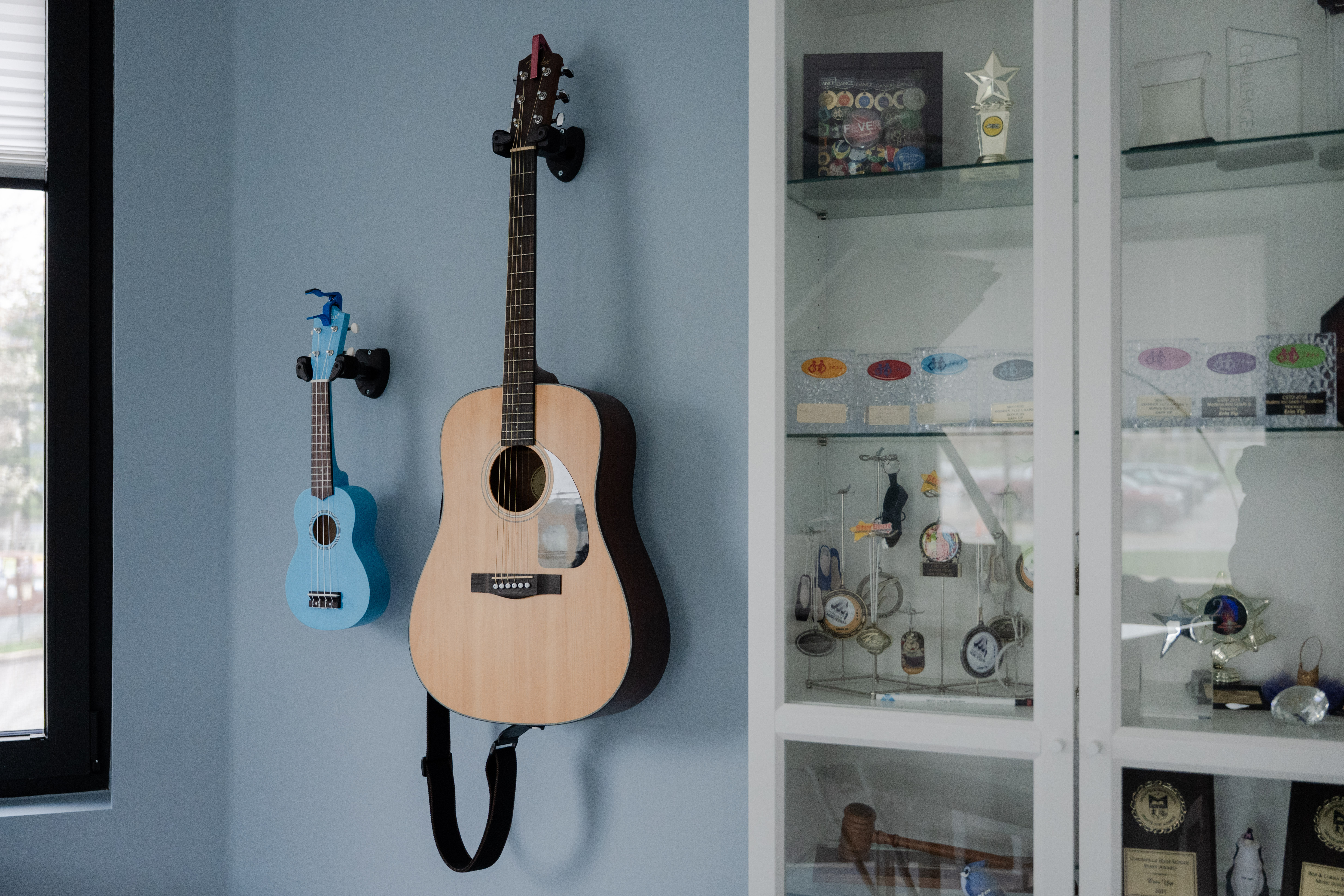 Guitars and display cabinet in Erin’s music studio